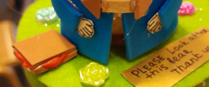 a picture of an egg dressed as Paddington Bear